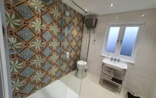 Luxury tiled modern bathroom in surrey home renovation