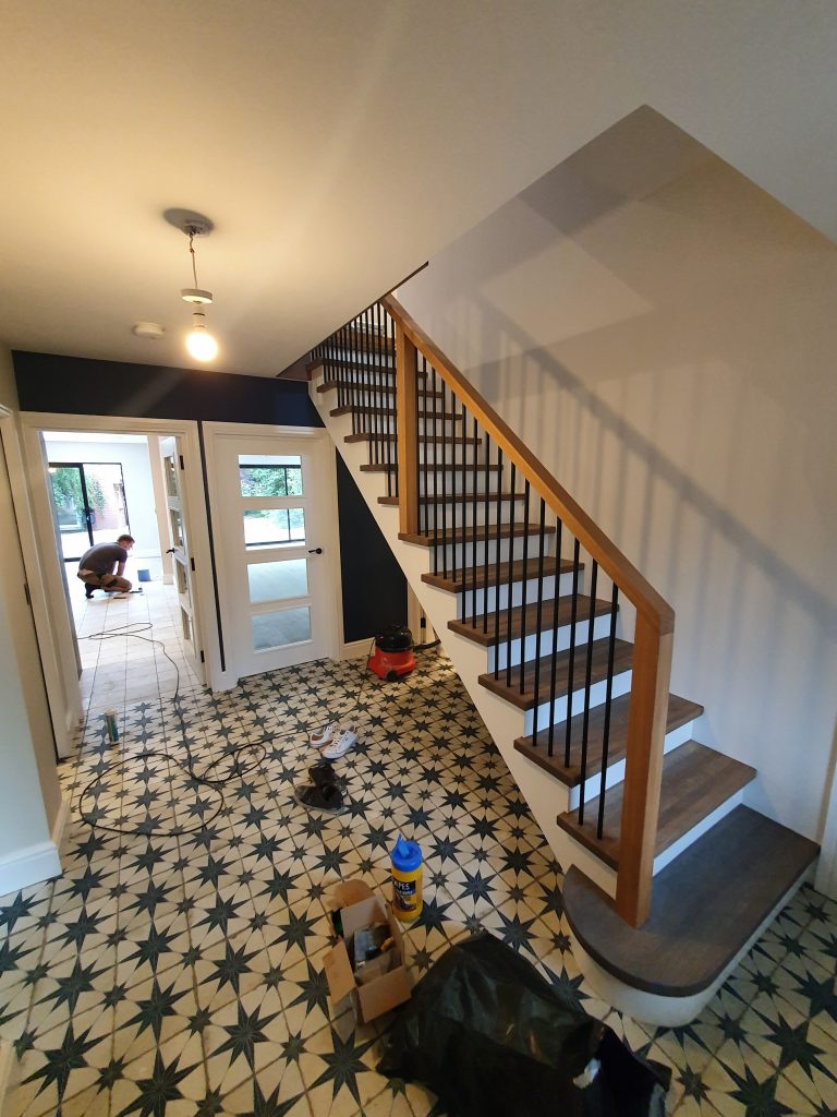 star pattern tiled floor in family home extension project