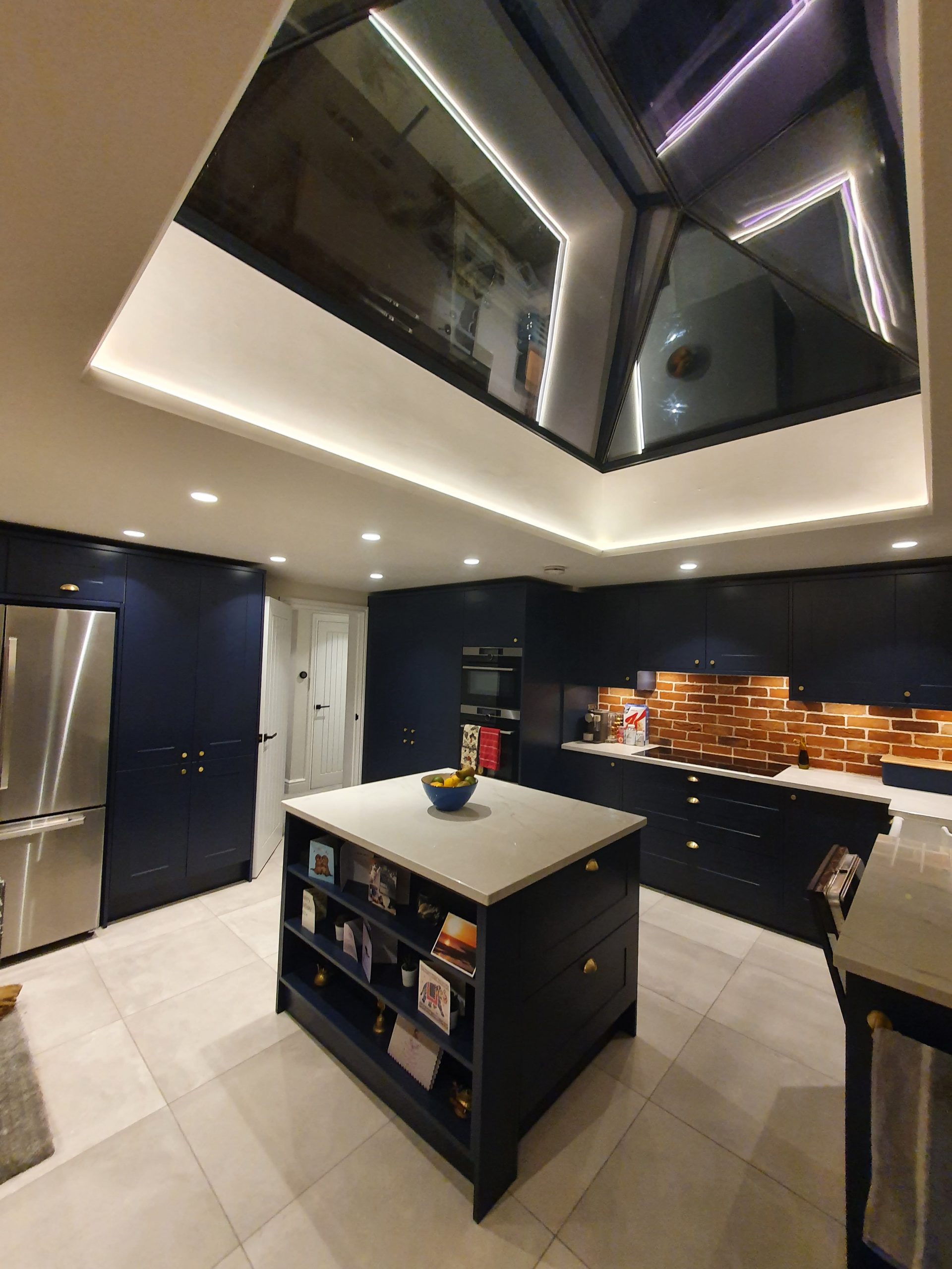 Skylight view in new extended kitchen with dark blue units