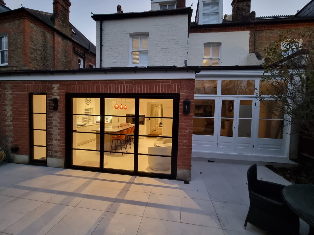 Twickenham home extension after picture External after view of Home Extension project with Crittal style doors