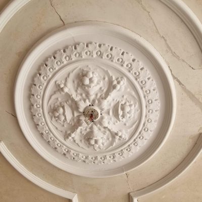 Painted ceiling rose preserving period property details
