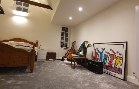 exposed beams detail in the vaulted ceiling bedroom