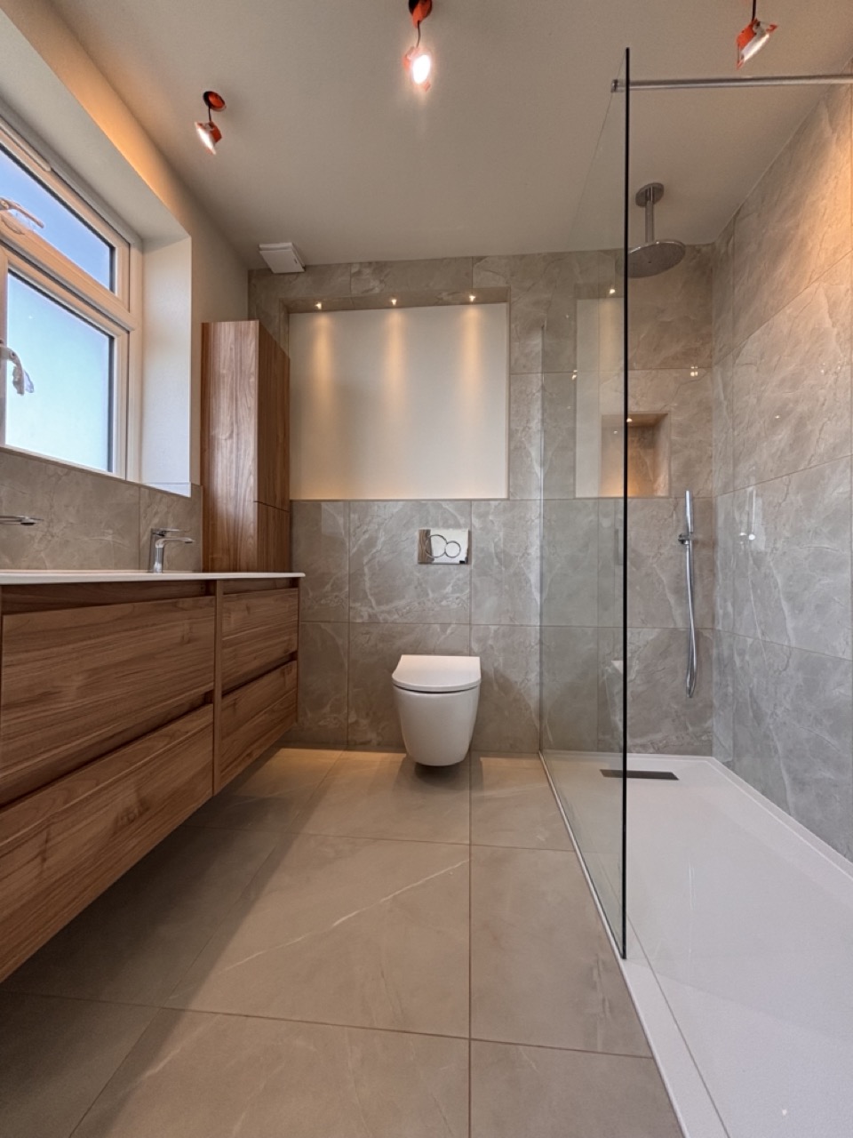 bathroom in loft conversion project with walk in shower