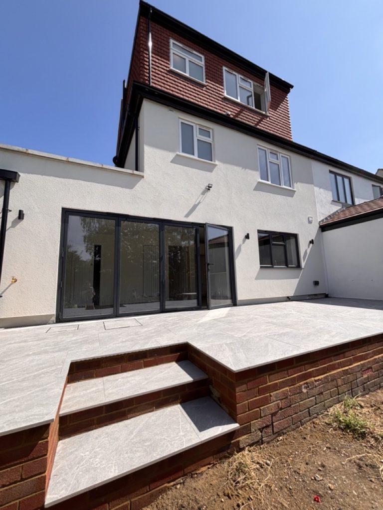 completed rear exterior of rendered semi detatched home