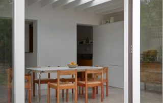 Open bifold doors of a complex rear extension project