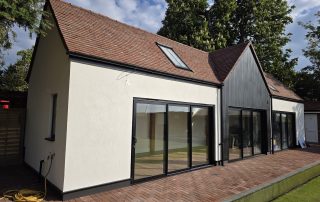 f201cbb5-0188-4615-9a01-e20f5035db9e Large completed new hurst bowling club building with wide aspect bifold doors